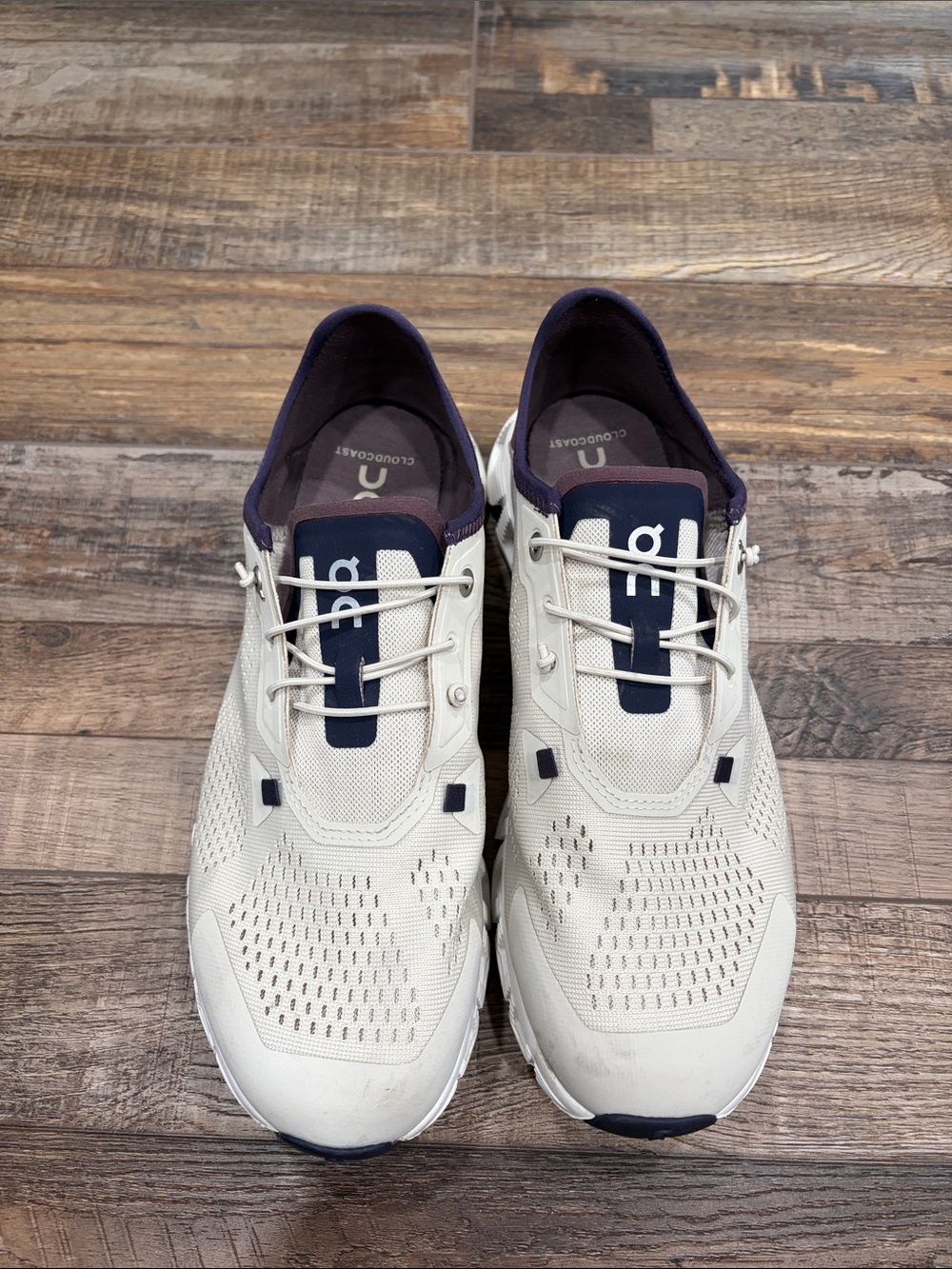 On Running Women's Sneakers in Cream and Navy Accent